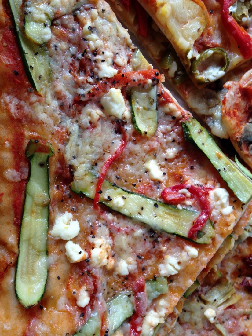 Tray-baked vegetable focaccia topped with courgette, peppers and cheese